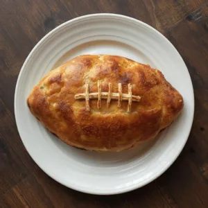 Football-Shaped Calzones: Irresistible Gameday Bites You Can't Resist! 7 Football-Shaped Calzones