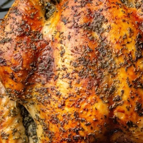 Delicious roast turkey served on a festive table with side dishes